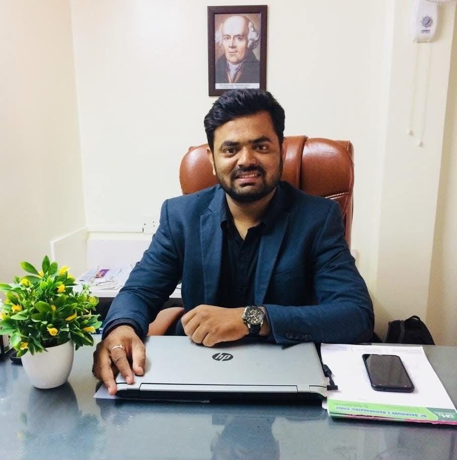 Dr. Rohit Deshmukh at his consulting desk